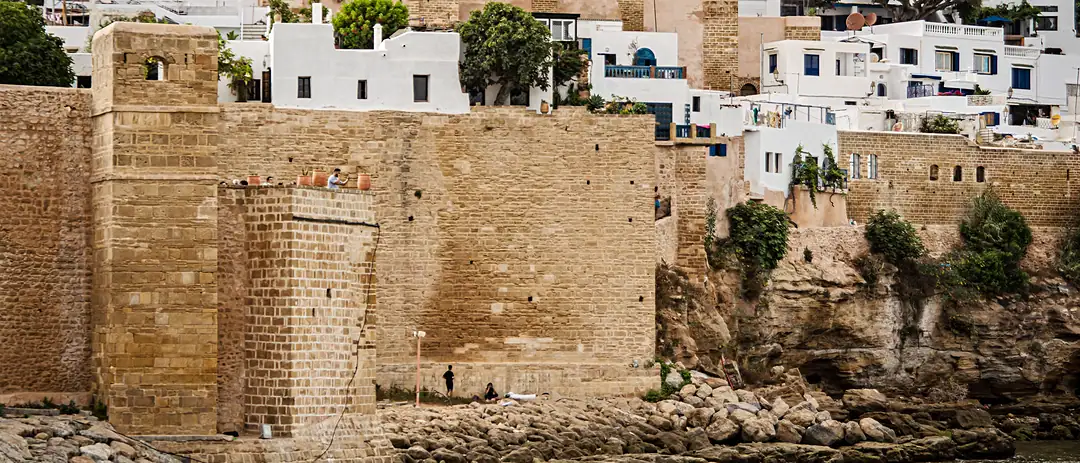 The ramparts of the Kasbah of the Udayas in Rabat above the mouth of the Bouregreg, white houses stepping up behind the walls